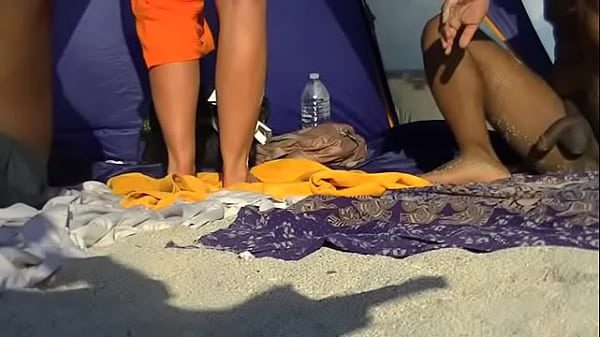 Exhibitionist Wife Helena Price 455 Part 2- Getting my ass massaged at the nude beach while voyeurs watch!  Hope my husband doesn’t mind! lol!